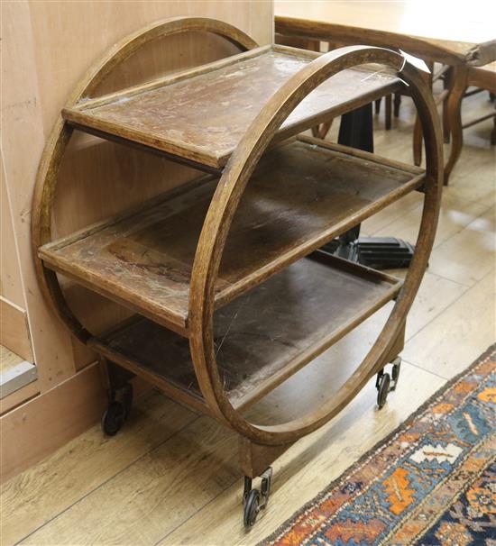 A 1930s oak tea trolley. W.75cm